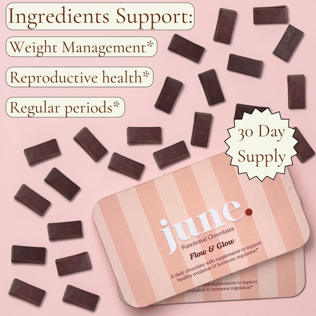 June Flow & Glow chocolate tin on a pink background